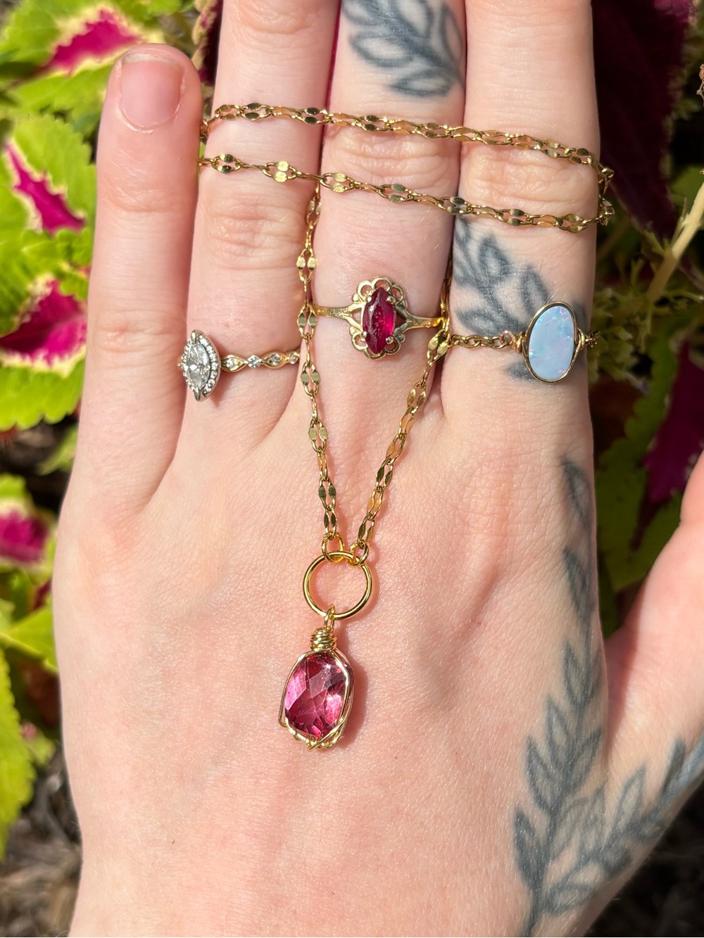 Pink topaz charm necklace